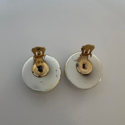 Vintage 1980s Clip on earrings with a Swirl design in bronze and white colours
