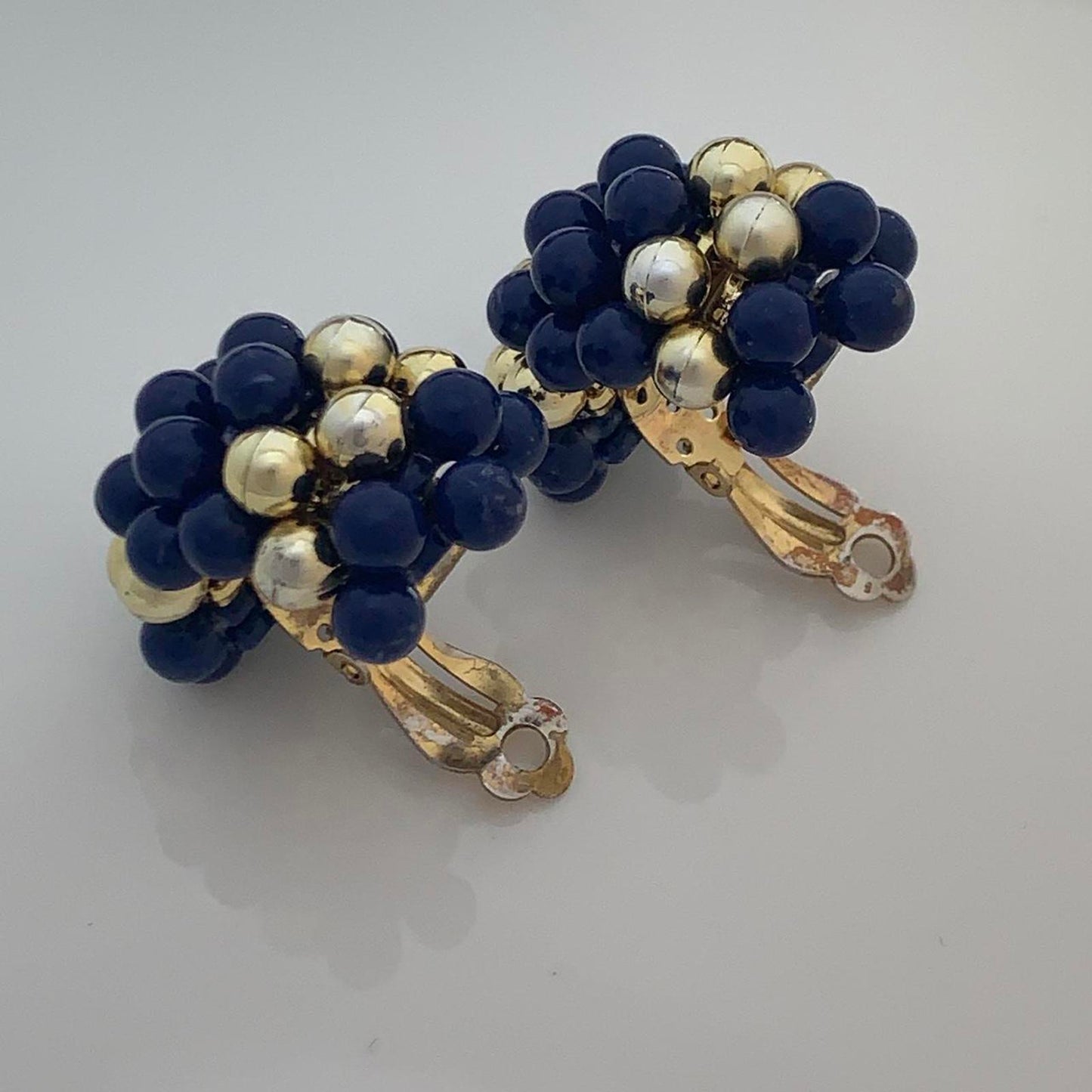 Vintage Clip on earrings featuring blue and gold coloured round beads