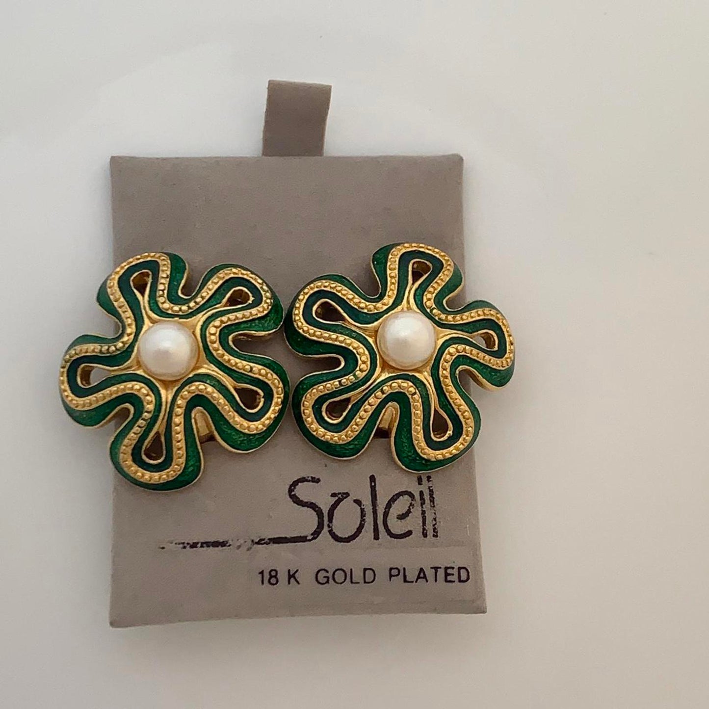 Soleil Vintage Clip on earrings featuring green enamel and faux pearls