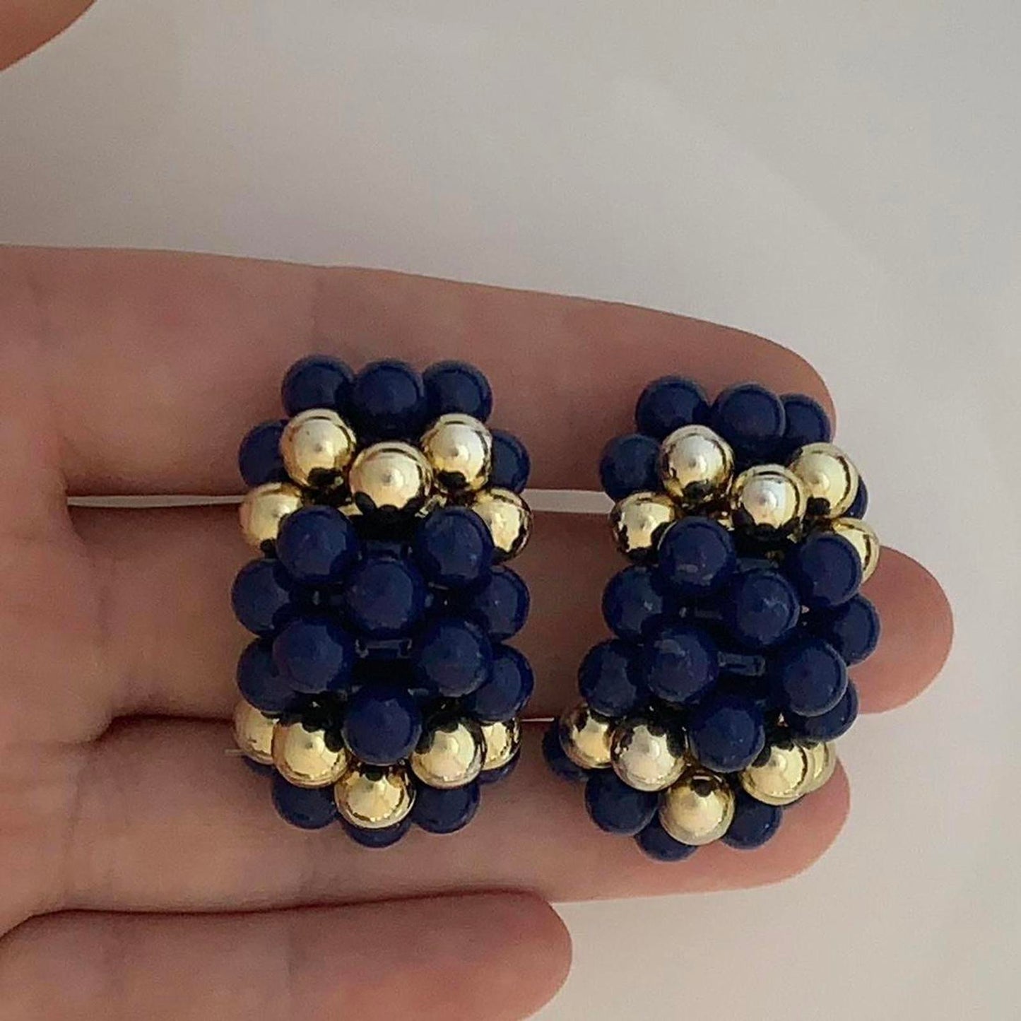 Vintage Clip on earrings featuring blue and gold coloured round beads