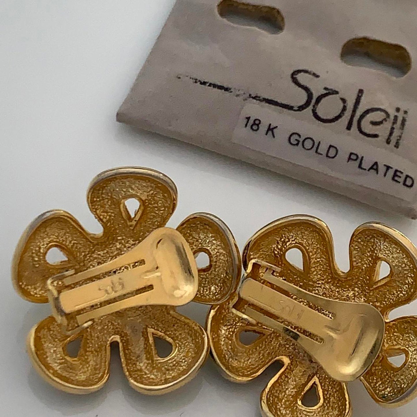 Soleil Vintage Clip on earrings featuring green enamel and faux pearls