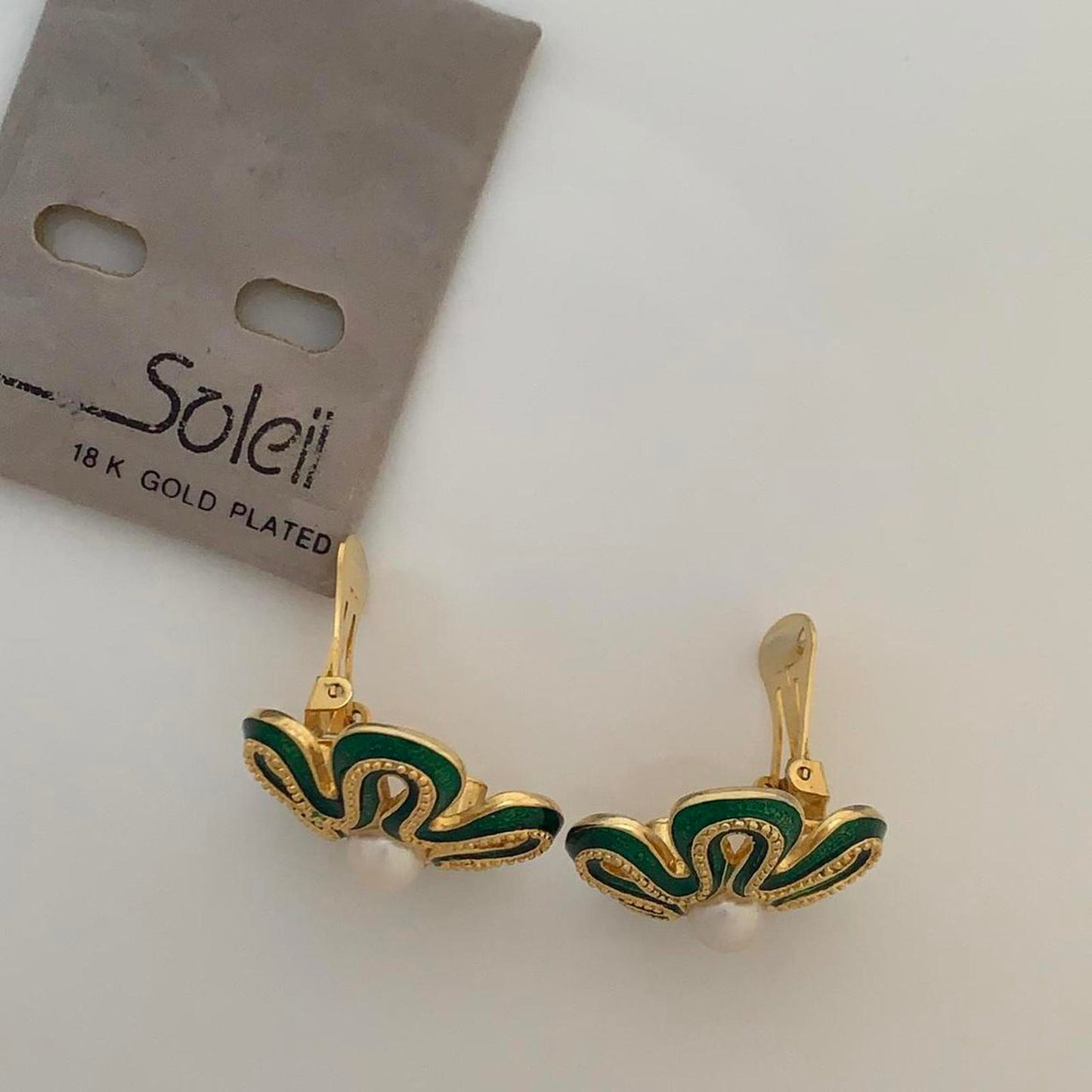 Soleil Vintage Clip on earrings featuring green enamel and faux pearls