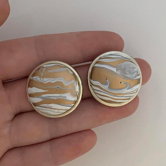 Vintage 1980s Clip on earrings with a Swirl design in bronze and white colours